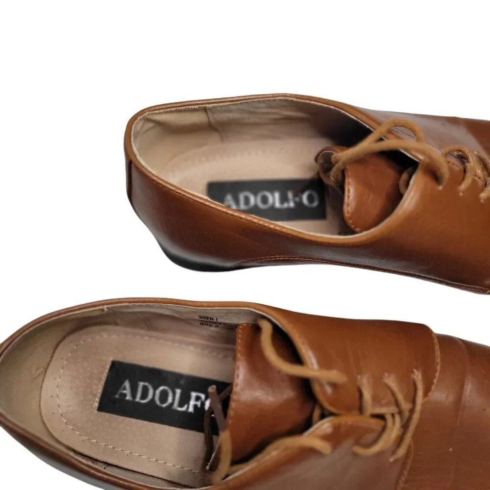Adolfo elegant sophisticated